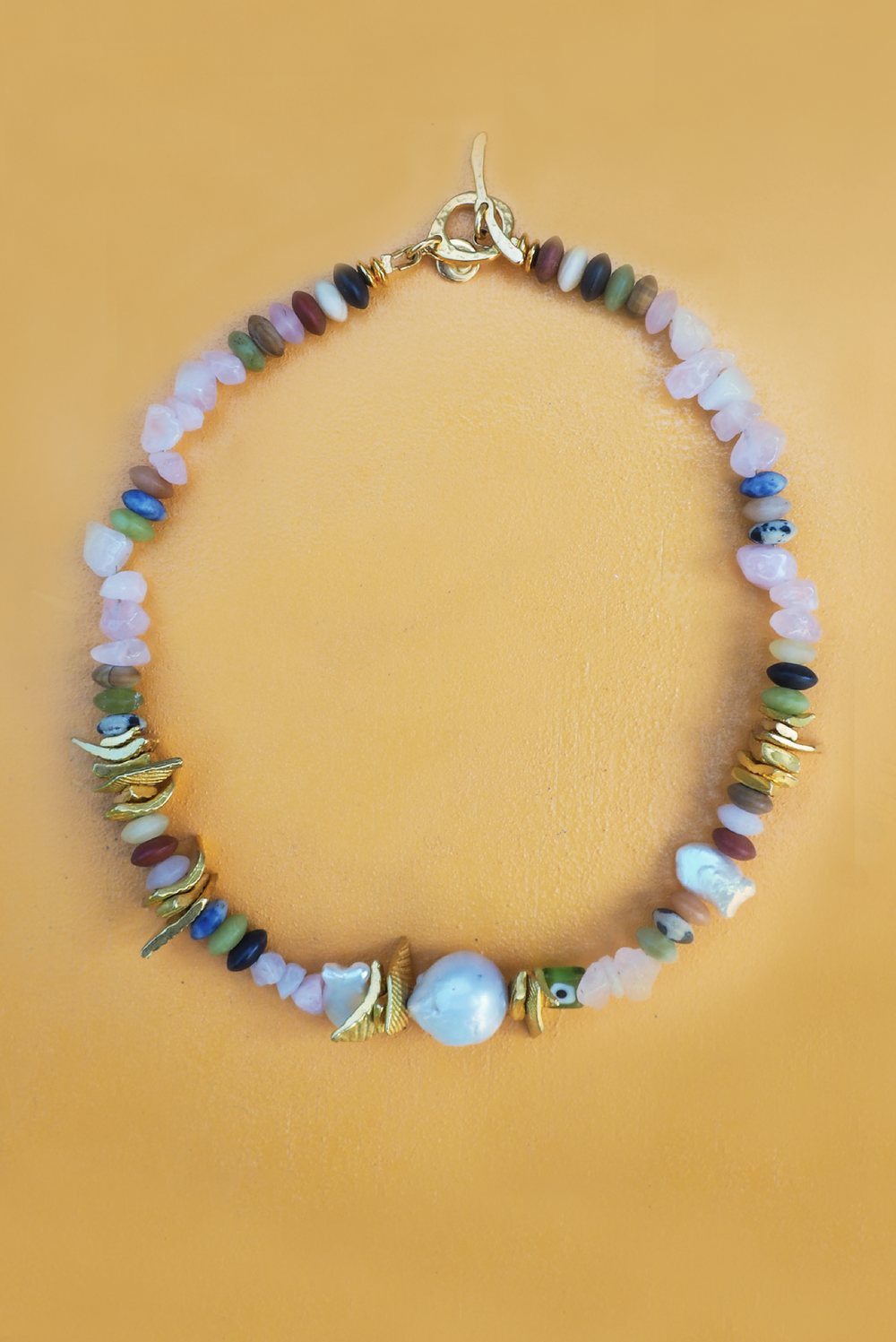 Catch a Wave Choker made by Greek brand Mayol, sold by Selini. 