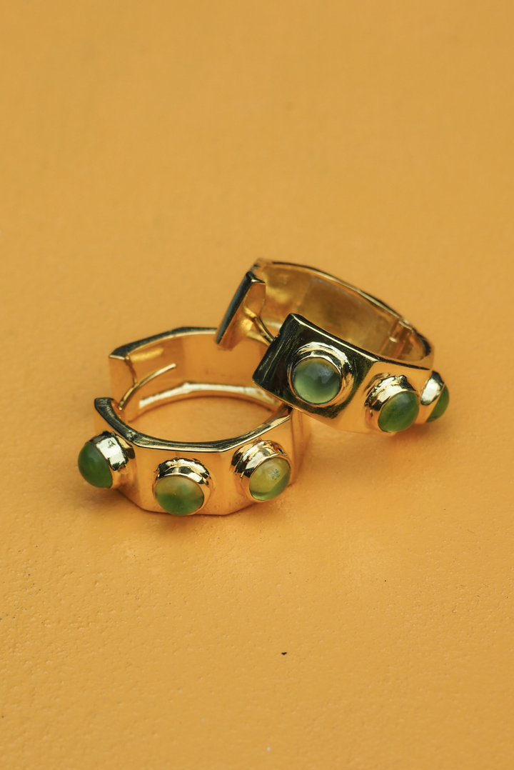 Dione Peridot Hoops made by Greek brand Inooku, sold by Selini. 
