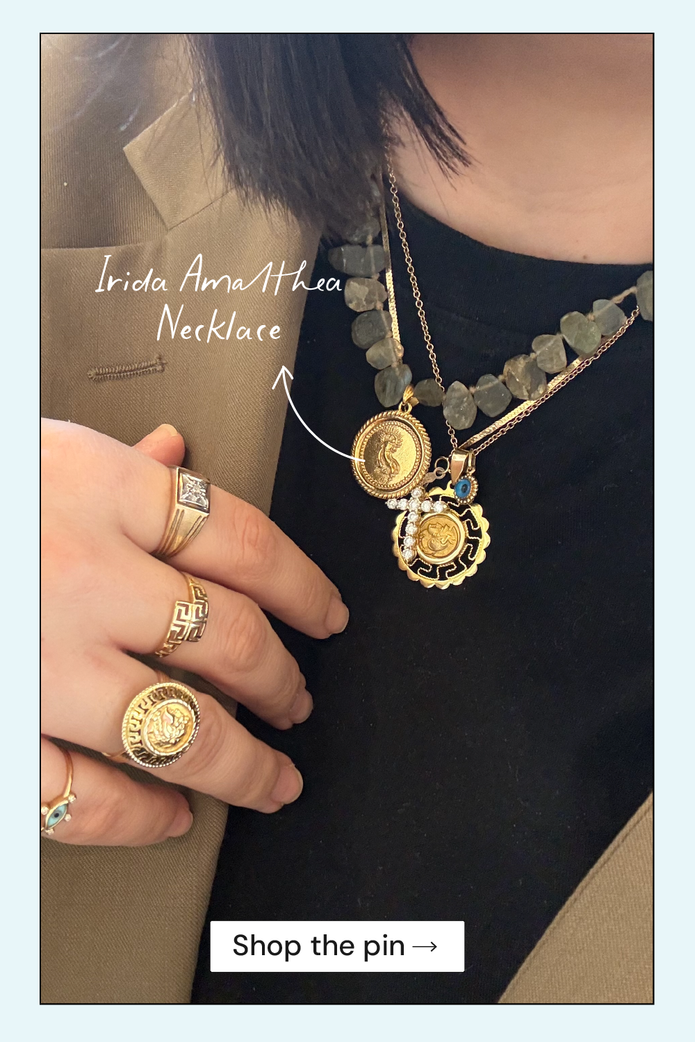 Gold necklace with coin designs worn by a person, with text pointing to the necklace and 'Shop the pin' text.