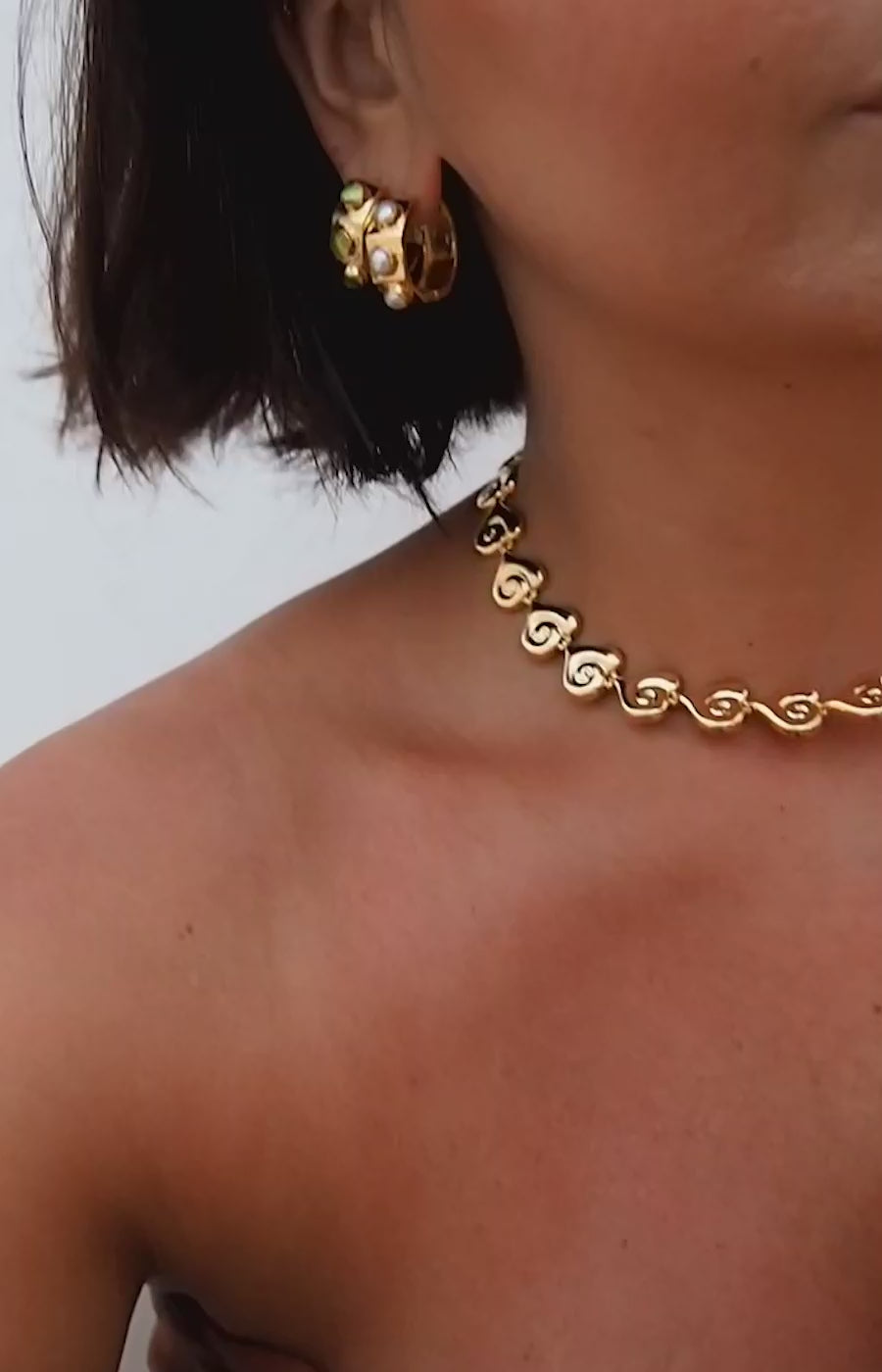 Dione Peridot Hoops made by Greek brand Inooku, sold by Selini.