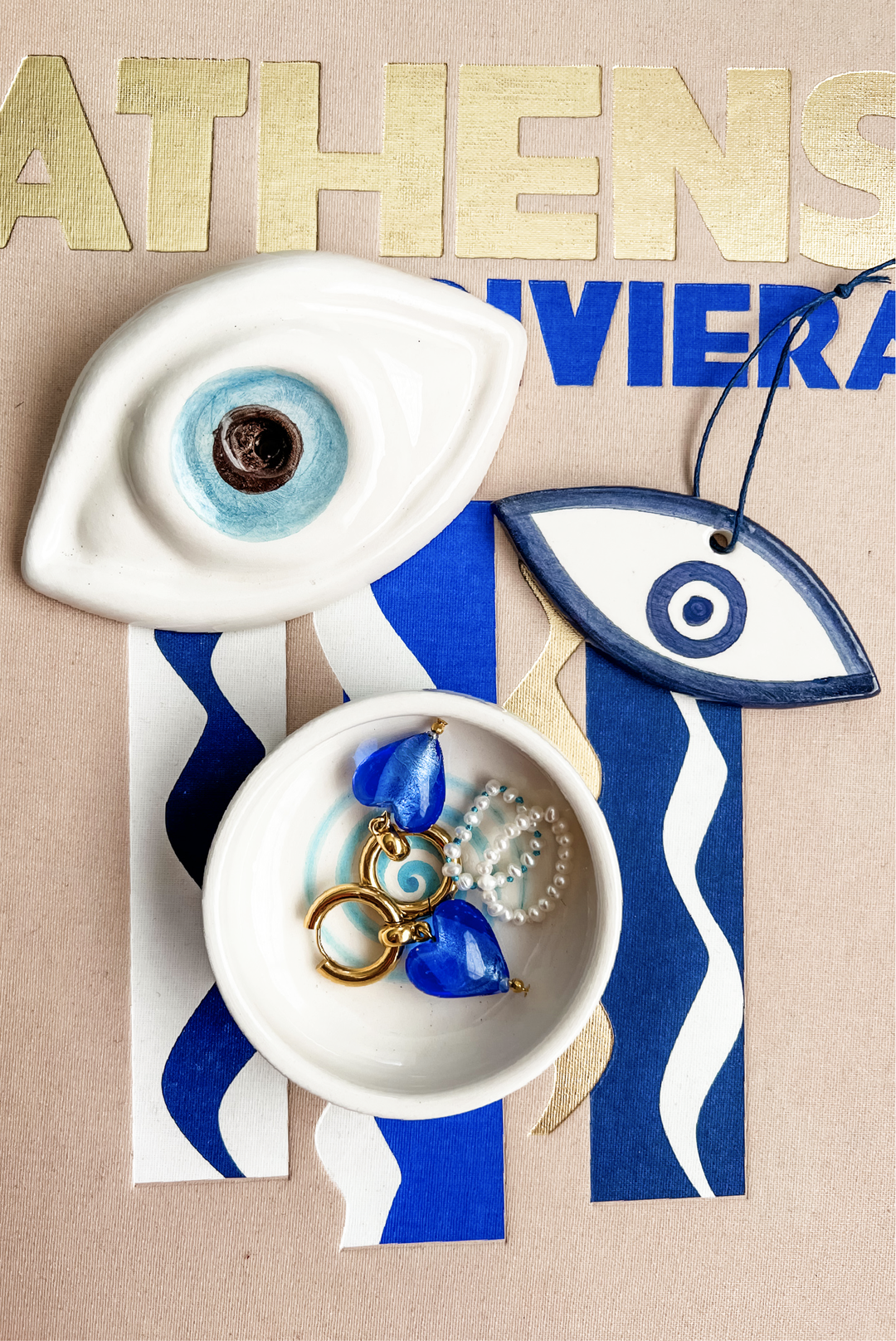 Ceramic Mati Charm made by Greek brand Roussos Ceramics, sold by Selini.