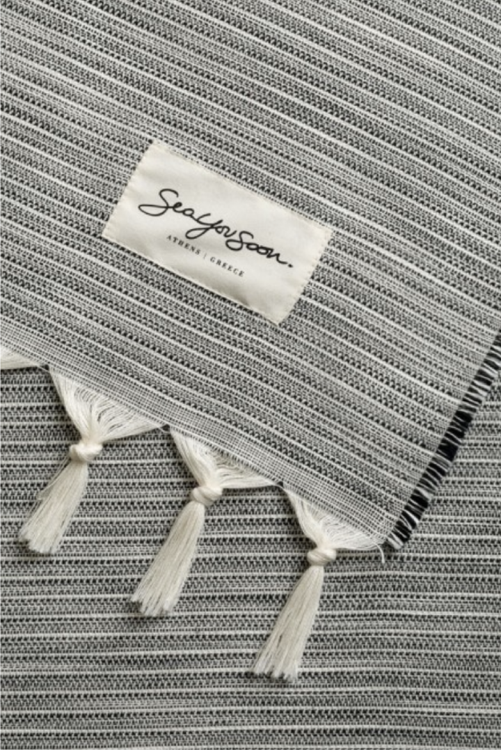 Fino Towel in Black made by Greek brand Sea You Soon, sold by Selini.