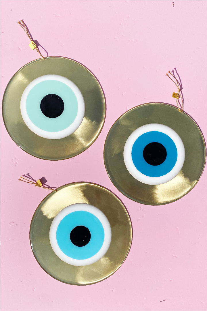 Mati Round Charm - Large Bronze made by Greek brand Bord De L'eau, sold by Selini. 