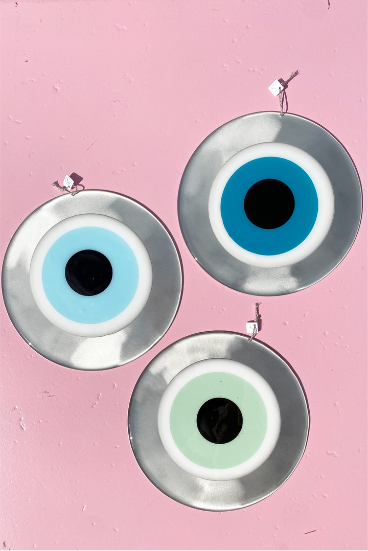 Mati Round Charm - Large Silver made by Greek brand Bord De L'eau, sold by Selini. 