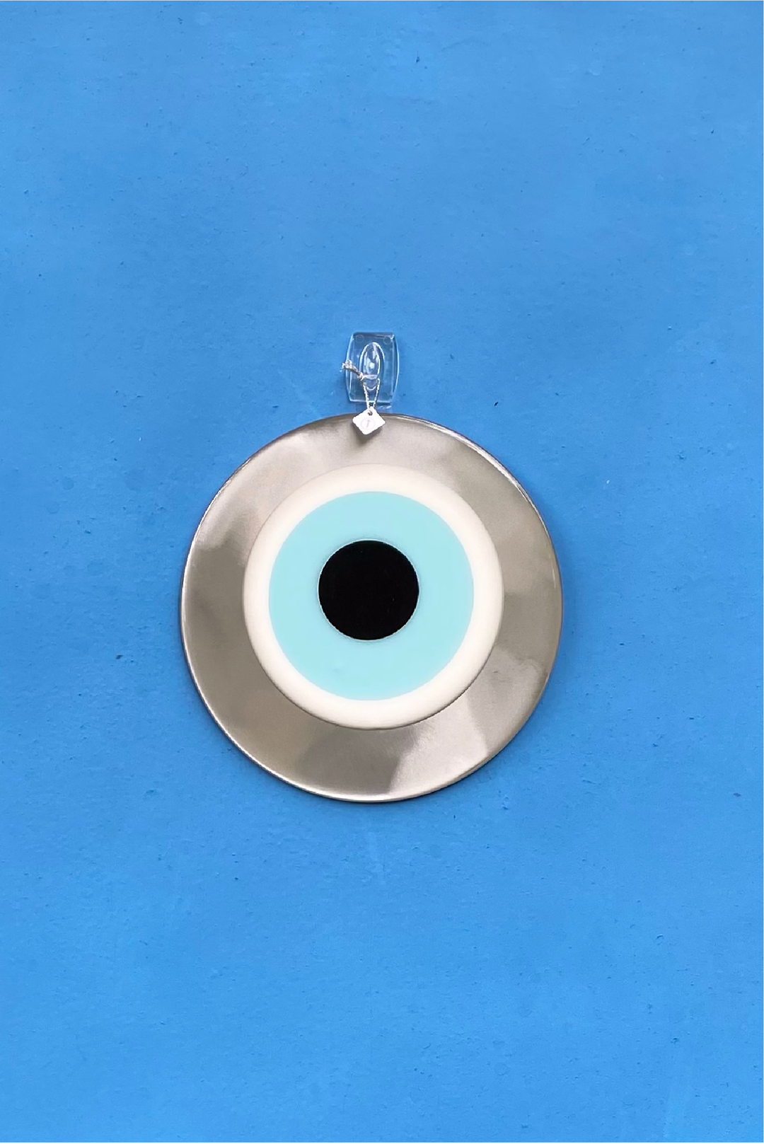 Mati Round Charm - Large Silver made by Greek brand Bord De L'eau, sold by Selini. 