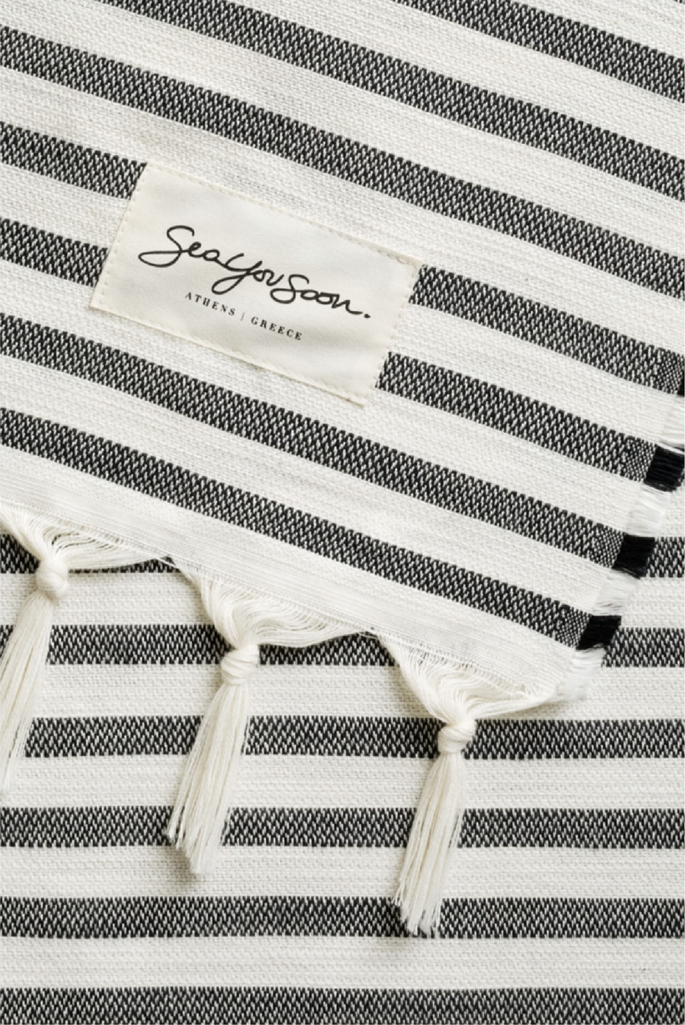 Tinetto Towel in Black made by Greek brand Sea You Soon, sold by Selini.
