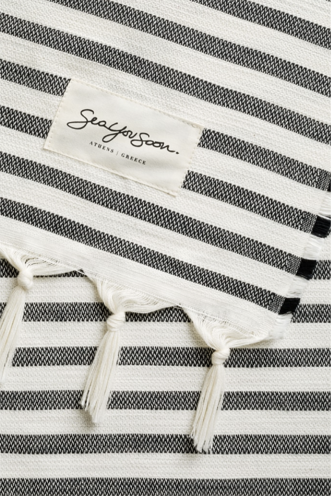 Tinetto Towel in Black made by Greek brand Sea You Soon, sold by Selini.