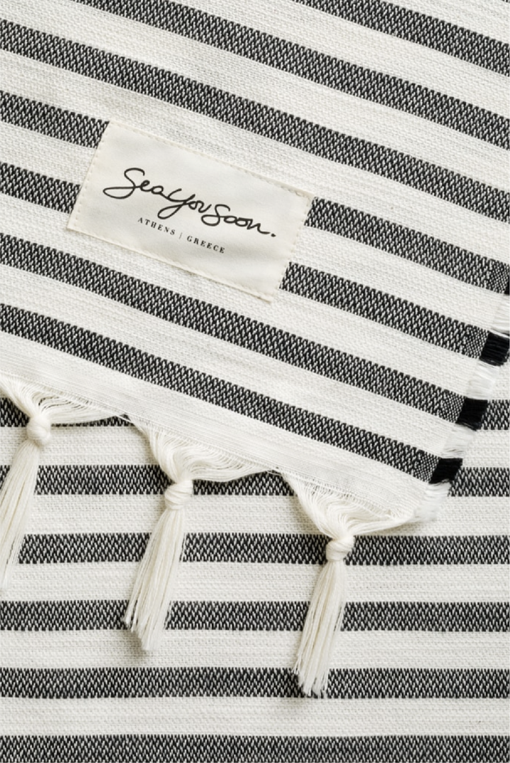 Tinetto Towel in Black made by Greek brand Sea You Soon, sold by Selini.